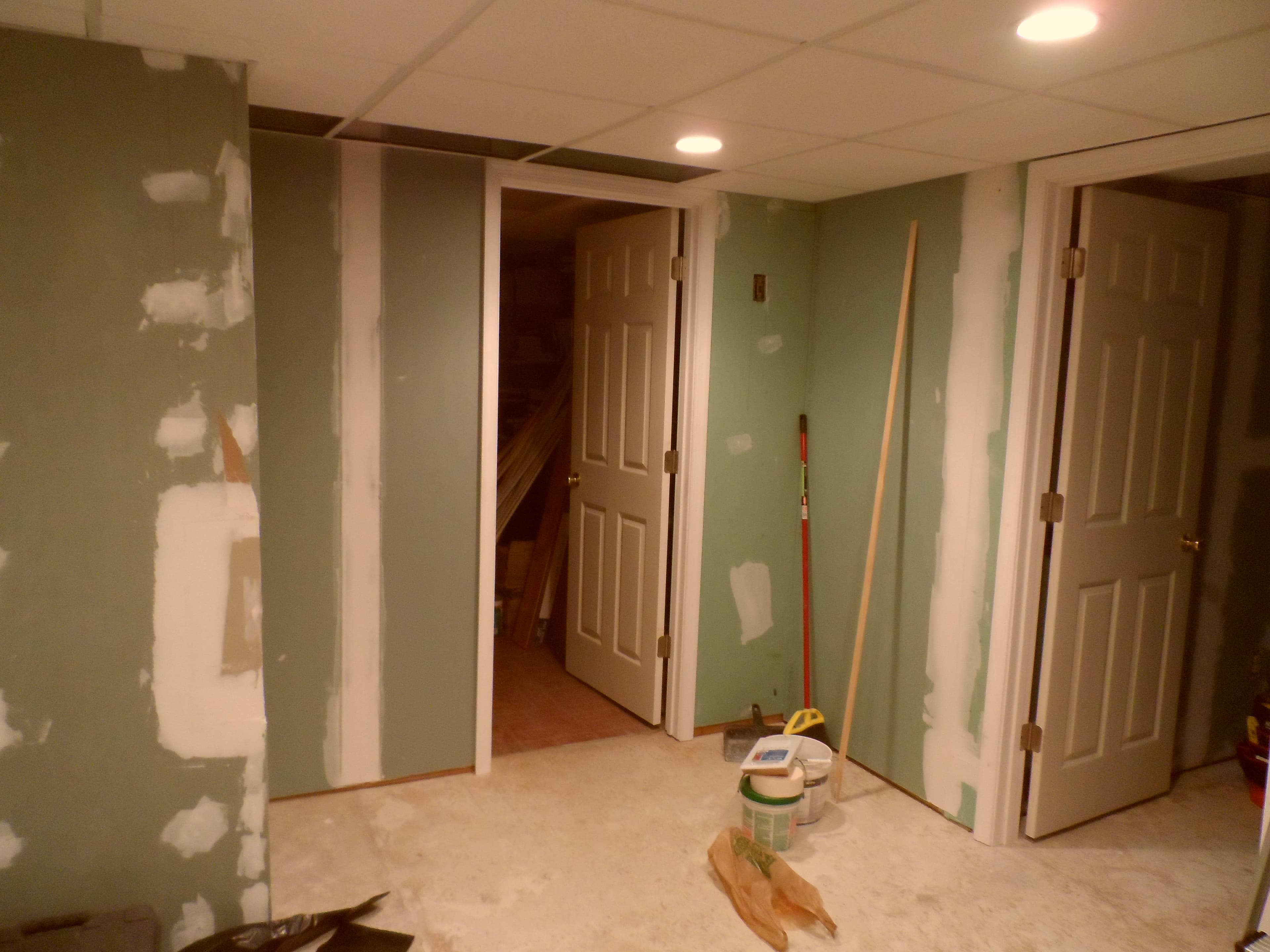 Basement room with kitchen before image 1