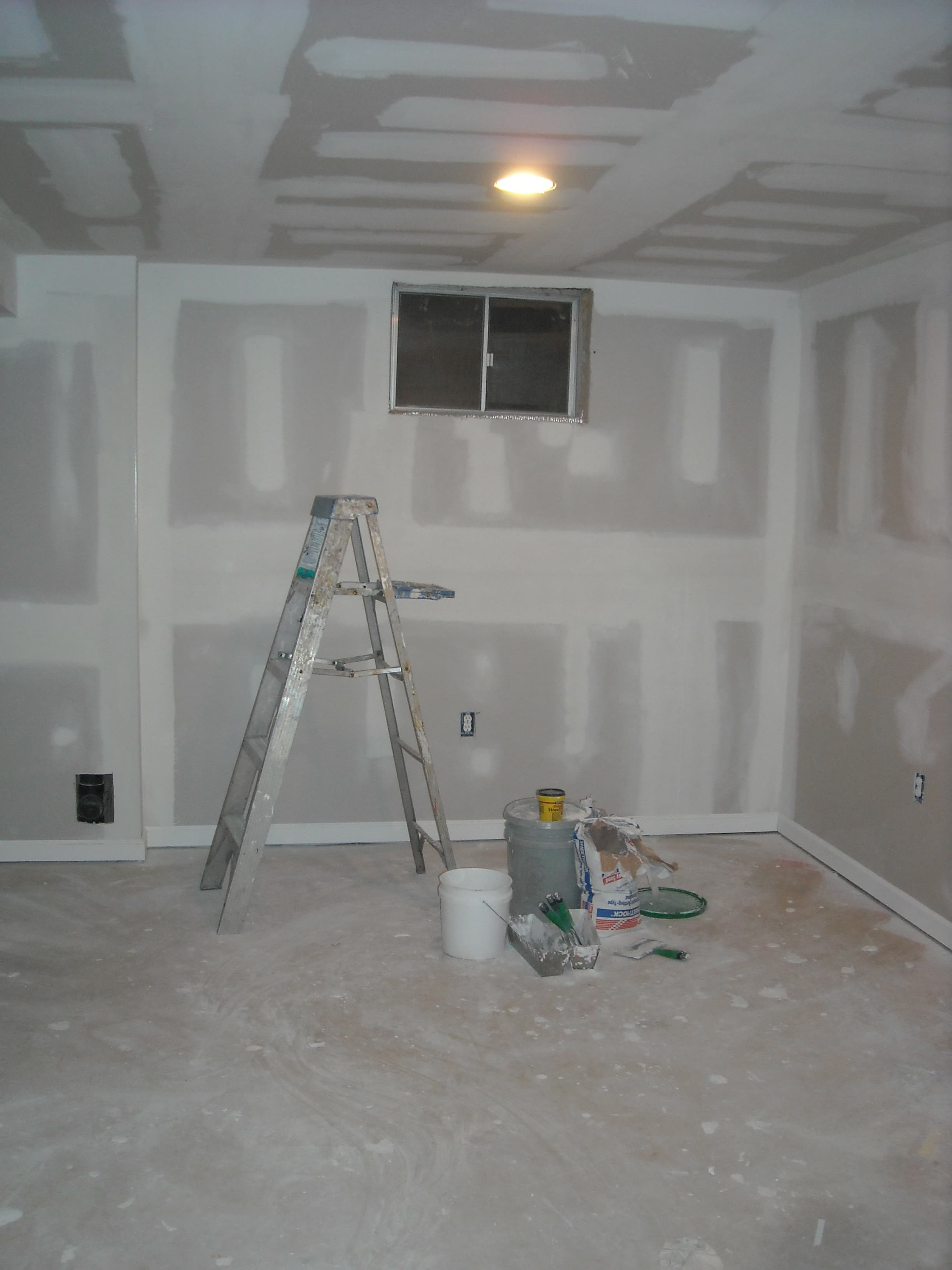 Basement with standing shower additional before image 1