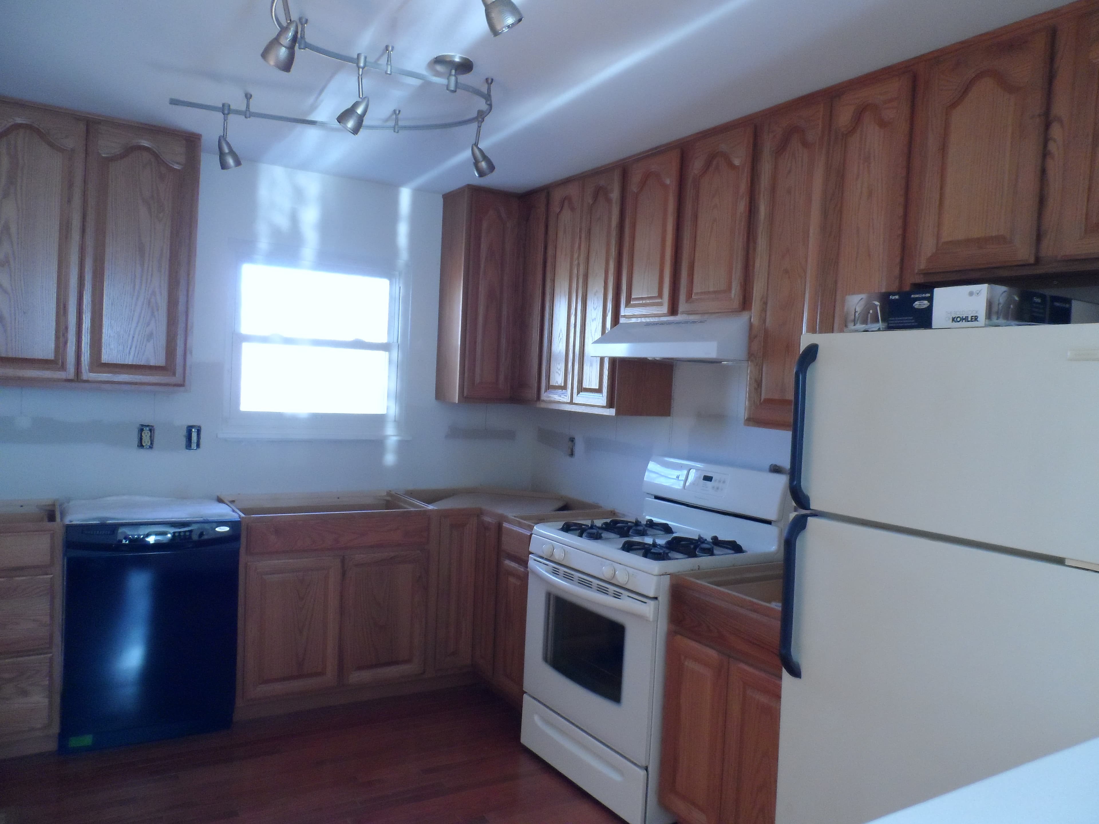 Installation of new kitchen cabinets after image 3